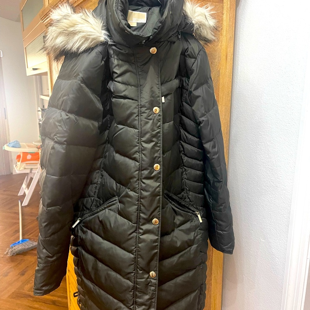 Michael Kohrs dark olive coat